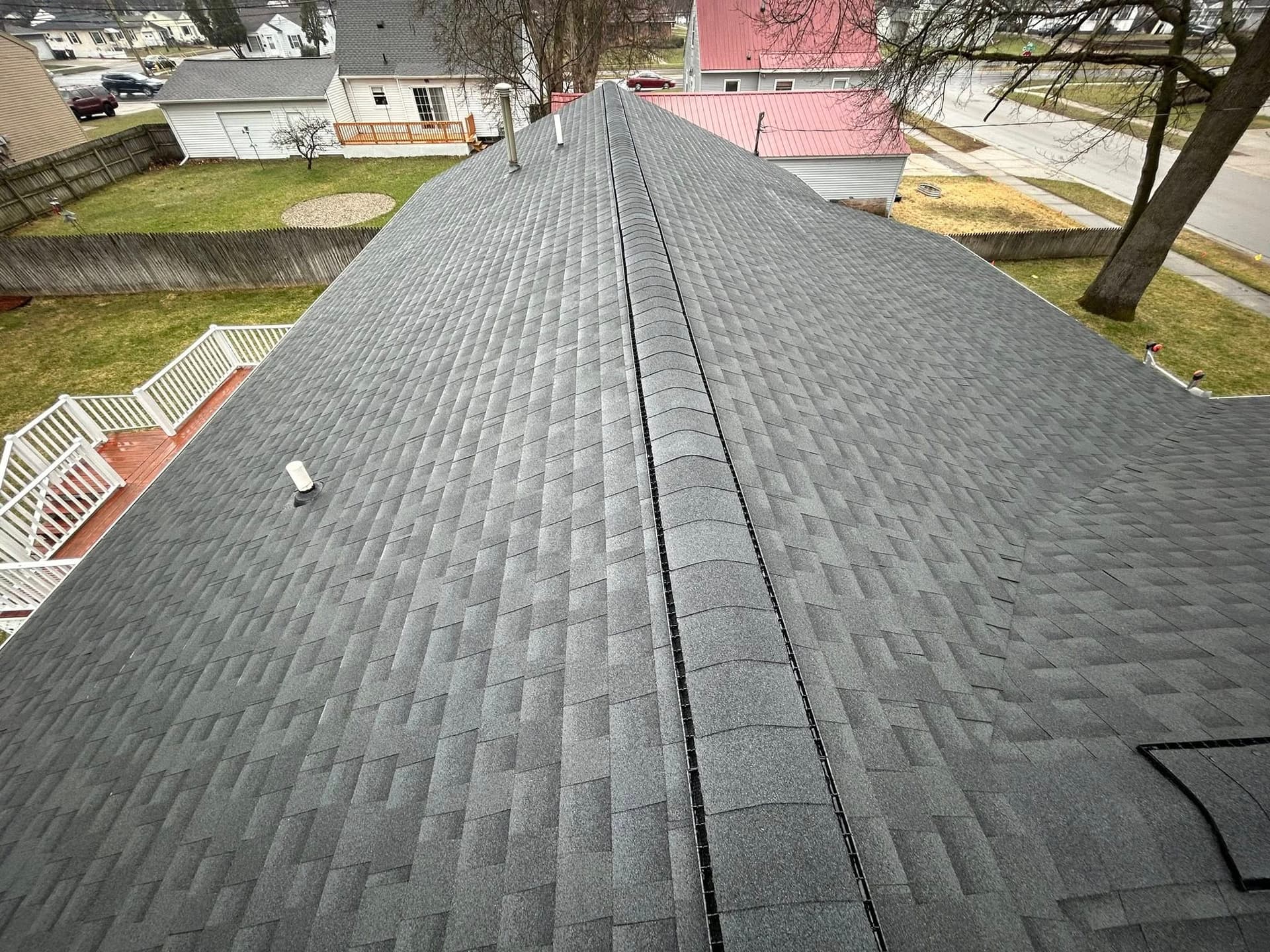 Completed roof replacement with clean ridge lines